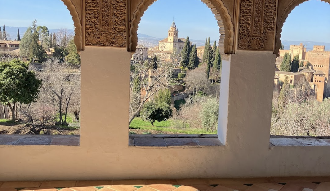 Alhambra seen through three window arches