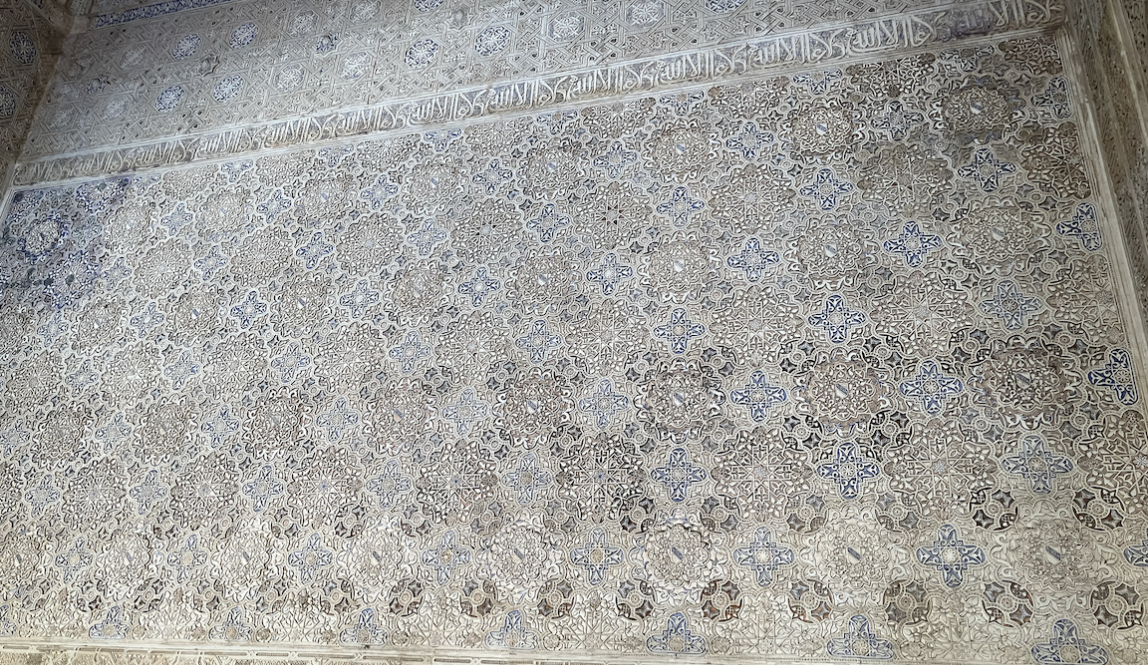 Intricate patterns on a white wall