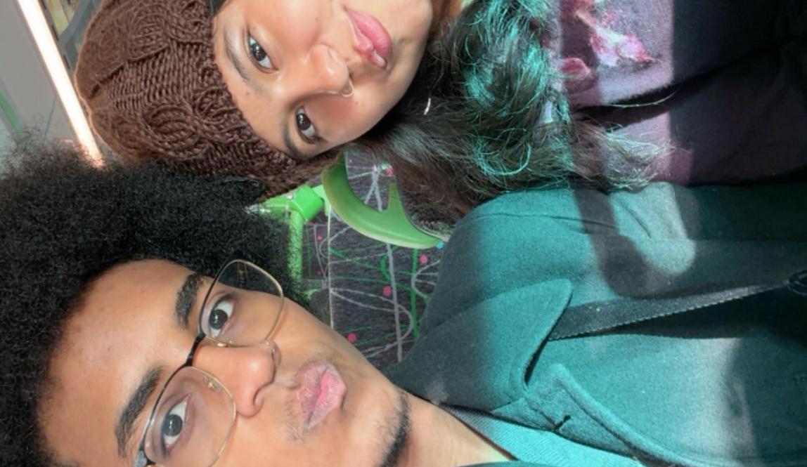 Two people taking a selfie