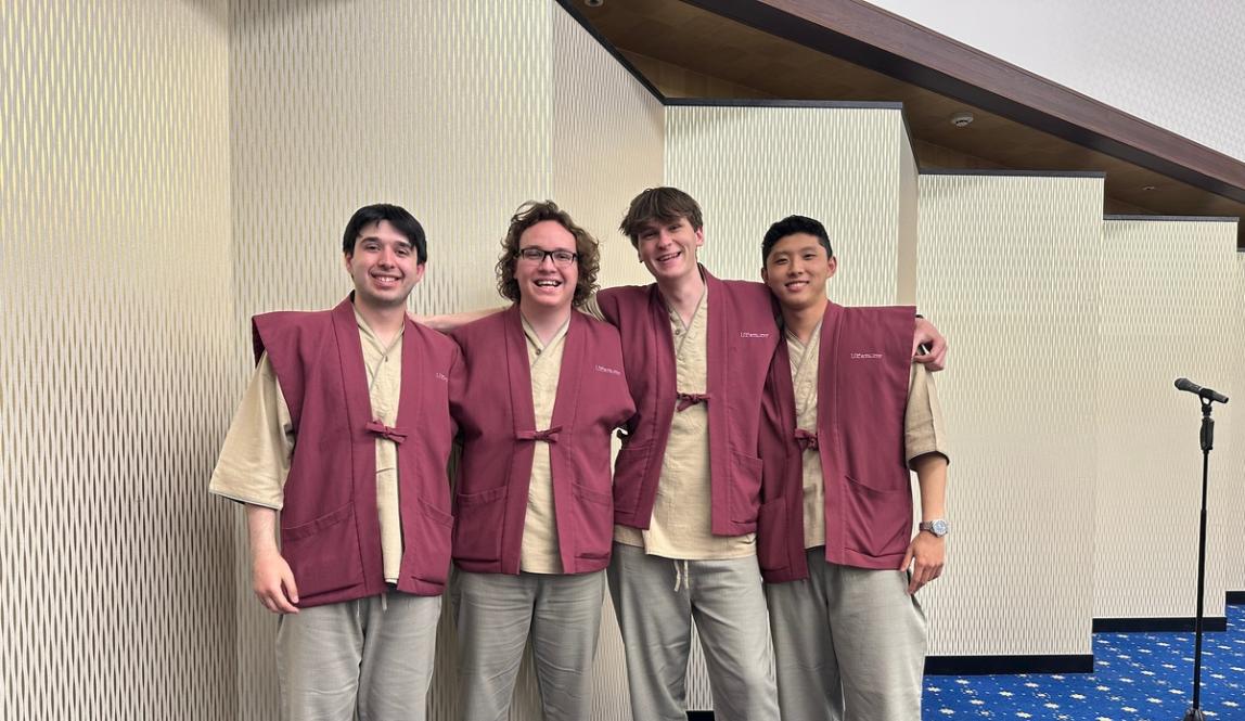 Students smiling on a field trip in Tokyo