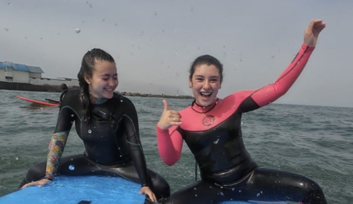 Ella and I surfing