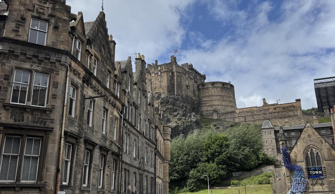 The view of Edinburgh Castle from a street below