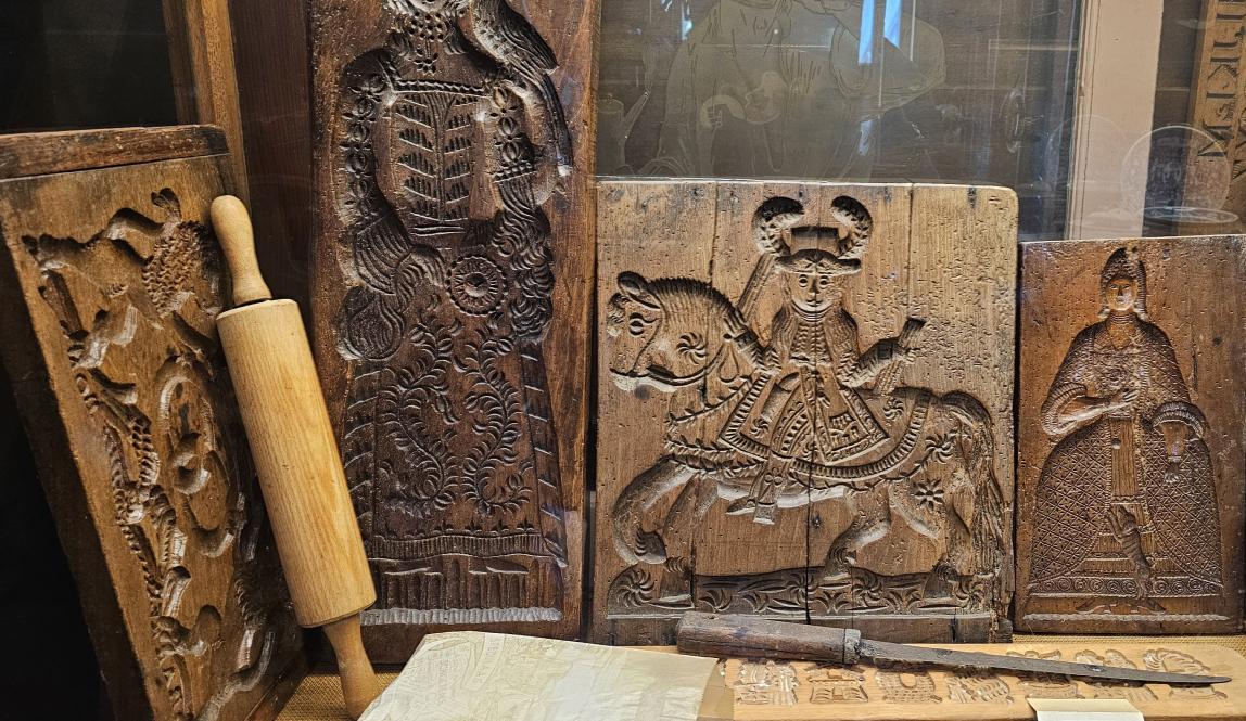 Wooden carvings of important members of society used to shape bread or moldable foods. 