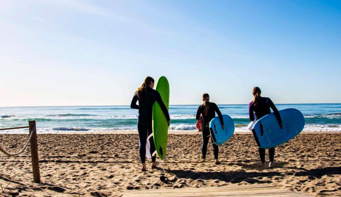 Surfers at a Barcelona beach