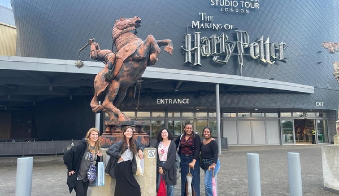 Students in front of Harry Potter Studios in London.