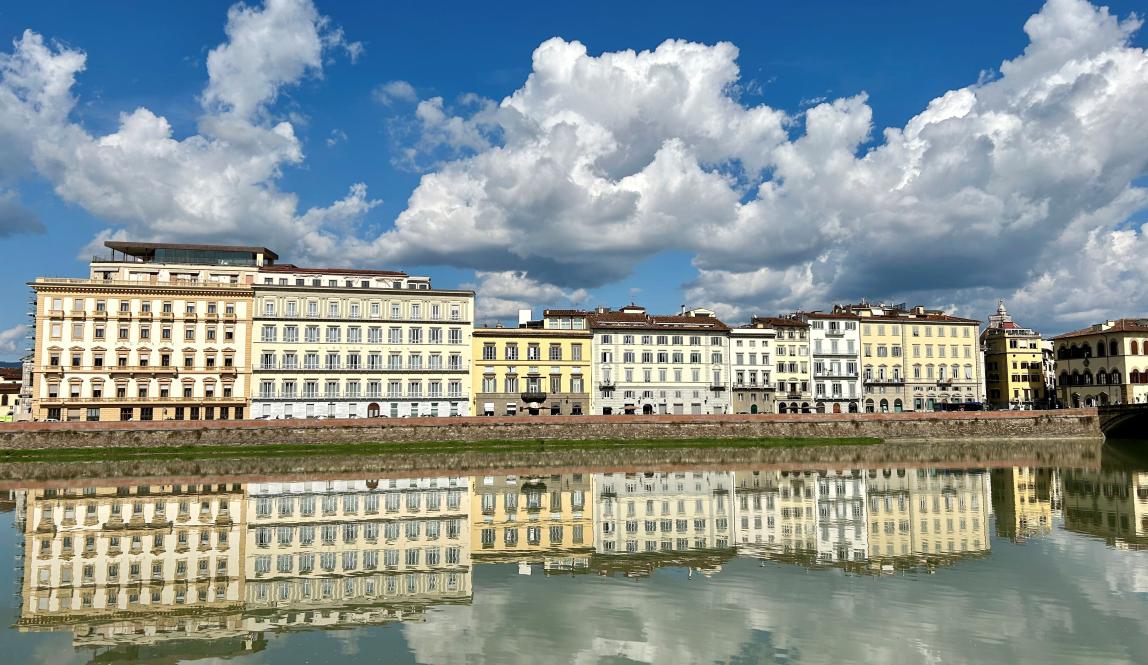 Skyline of Florence reflecting on the Arno river