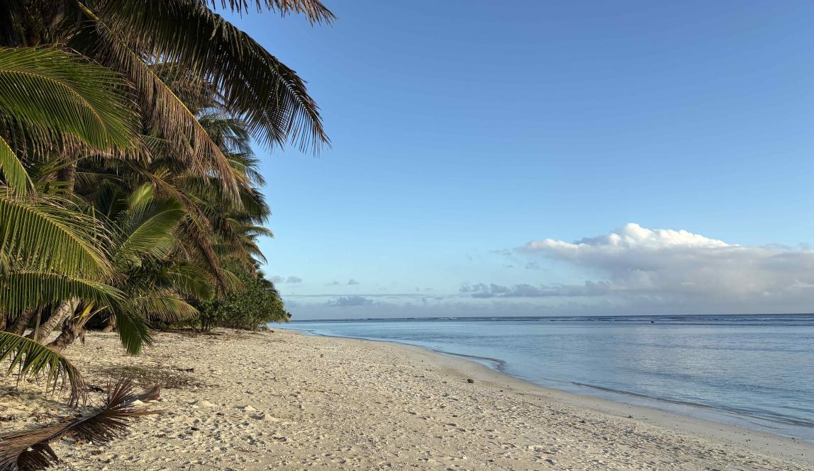 A flat, white sand beach coast