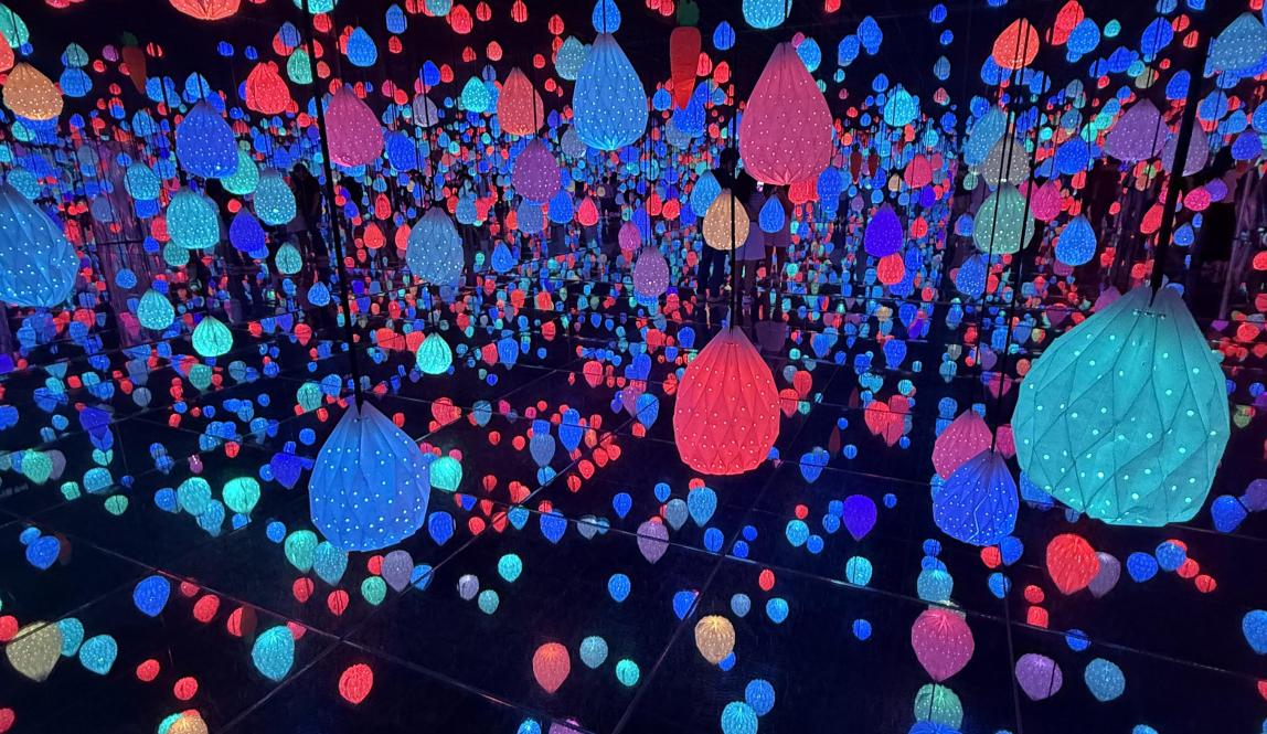 Room with colorful hanging glowing lights