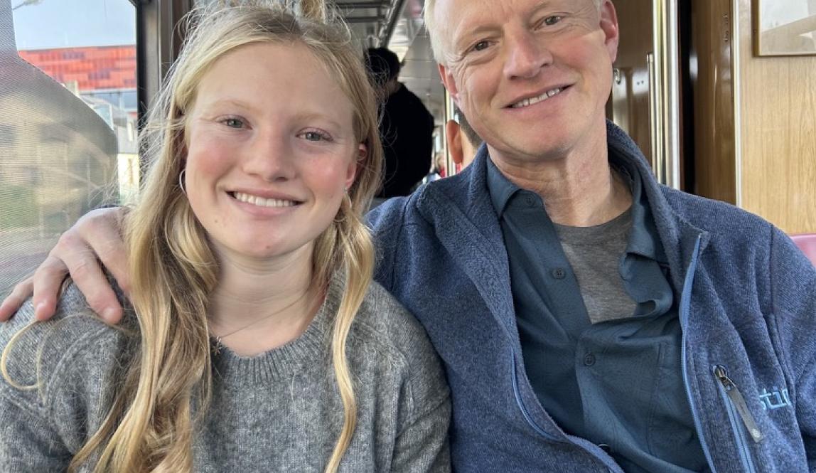 The author sits beside her father on one of Freiburgs historic trams