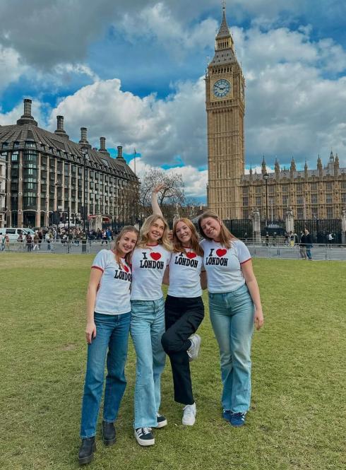 group of students wearing tee shirts that say i love london in front of big ben