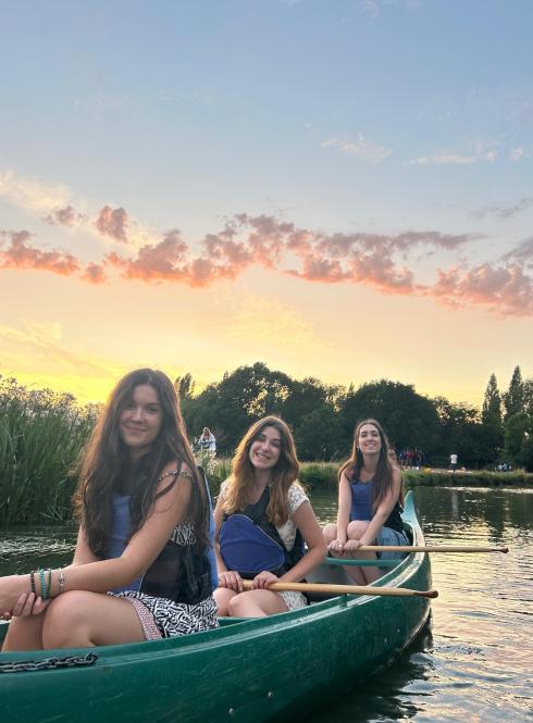 3 students on kayak on a river in Cambridge 