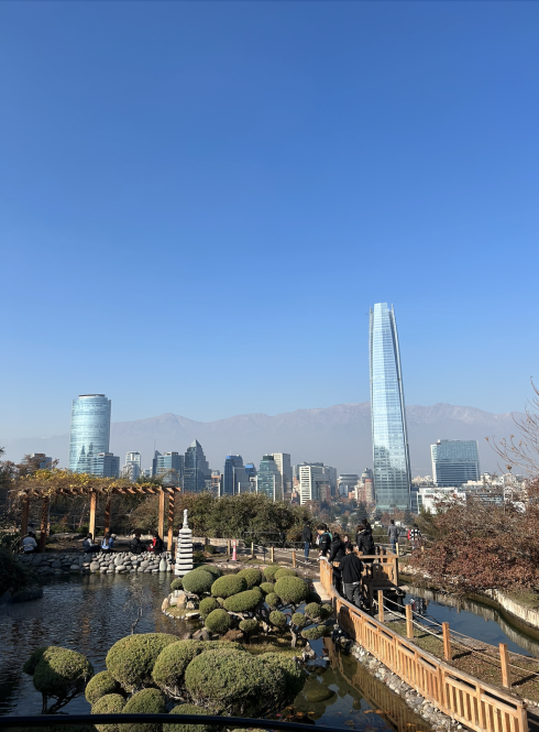Asian-style gardens in front of Santiago's skyline and the Andes mountains