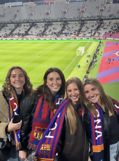 Friends at a soccer game in Barcelona