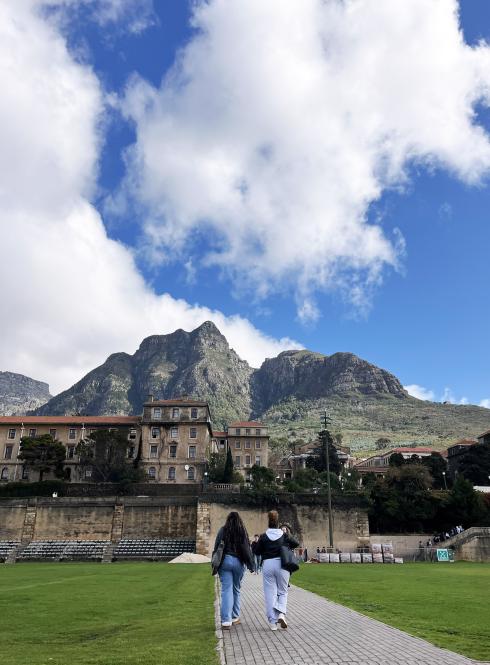 Two friends walking to class at the University of Cape Town in Cape Town, South Africa