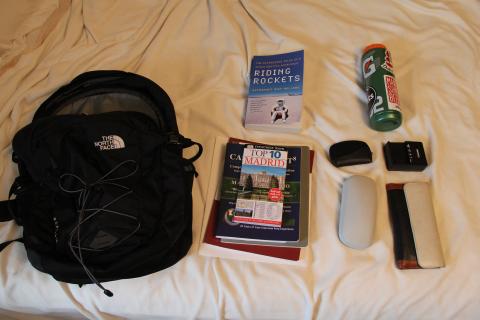 Everything I need in my backpack for the next week of travel minus my computer and camera!