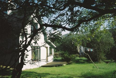 An image of a house and clothesline