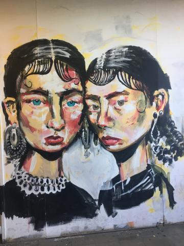 Street art depicting two girls