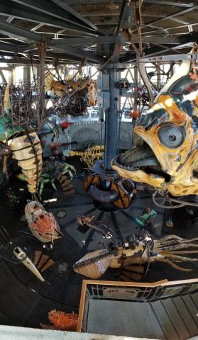 A carousel with various large marine animals