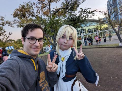 a selfie of myself with a cosplayer (published with permission)