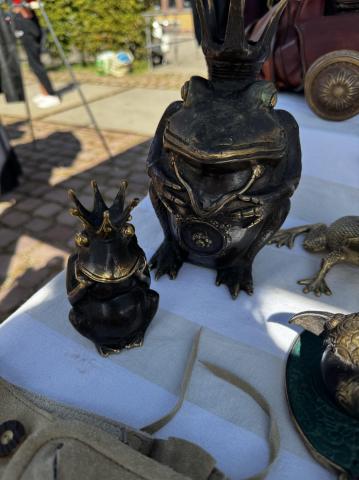 Antique frogs on a table