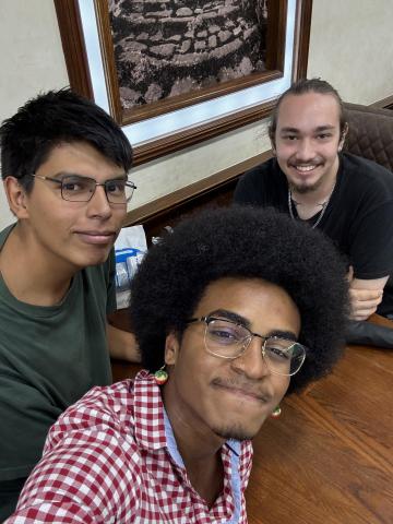 Three people taking a selfie