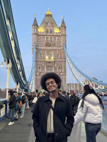 Man standing on a bridge