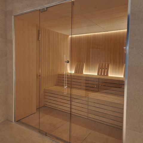 A sauna facility located next to the swimming pool area at Collegiate Milan Bovisa.