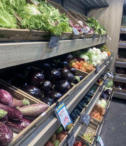A produce shelf in a Roman supermarket