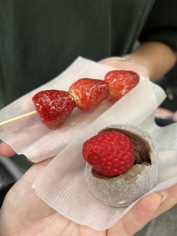 A couple sweets we got at the market (strawberry daifuku and candied strawberries)
