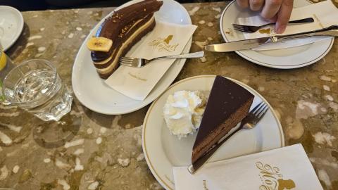 A Bananeschnitte and Sachretorte from Café Mozart.