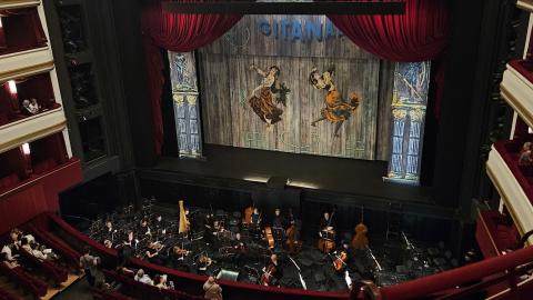 The view from gallery seats at the Volksoper, showing the whole stage and orchestra pit in preparation for the production of Carmen.