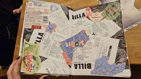A page in my junk journal, with receipts, food packaging, and collaged letters from things I bought for a picnic.