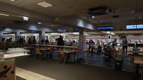 A shot of the inside of Plus Bowling Center, showing the bowling alleys.