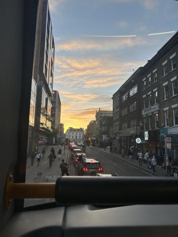 Street view of city with sunset