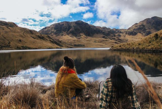 students visit a lake among the mountains in Ecuador