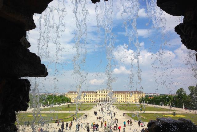Schönbrunn Palace in Vienna from behind a fountain