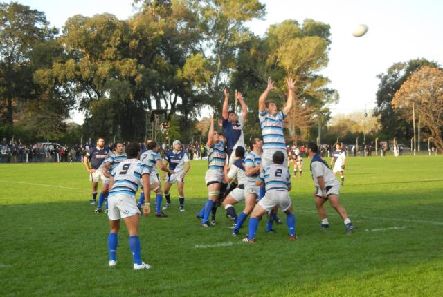 a group of male students playing rugby in Buenos Aires