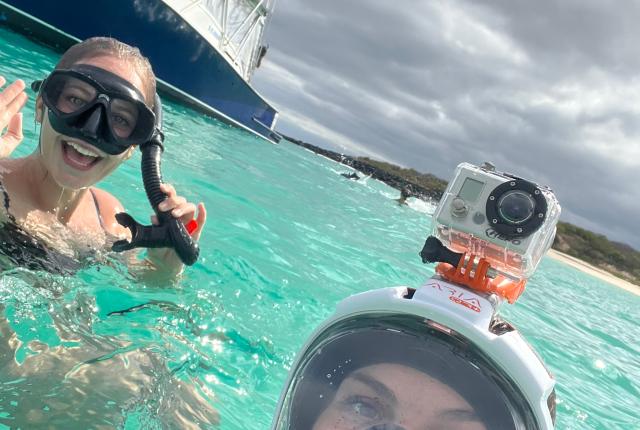 students snorkeling in Galápagos