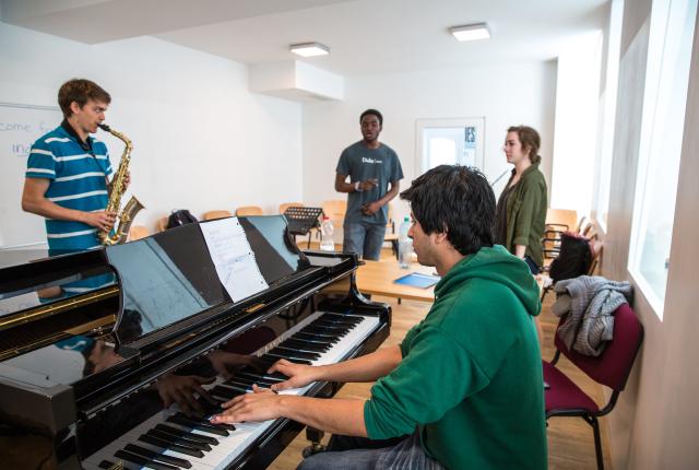 A student in Vienna, Austria practicing the piano.