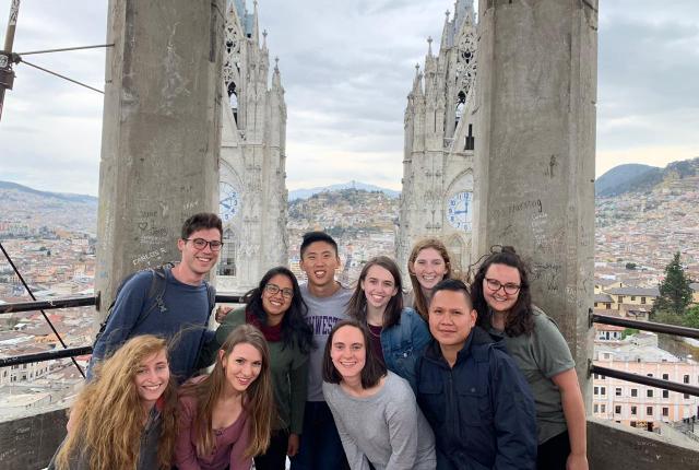 Students pose at the top of Basílica del Voto Nacional in Quito. 