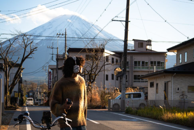 Student with bike in Tokyo