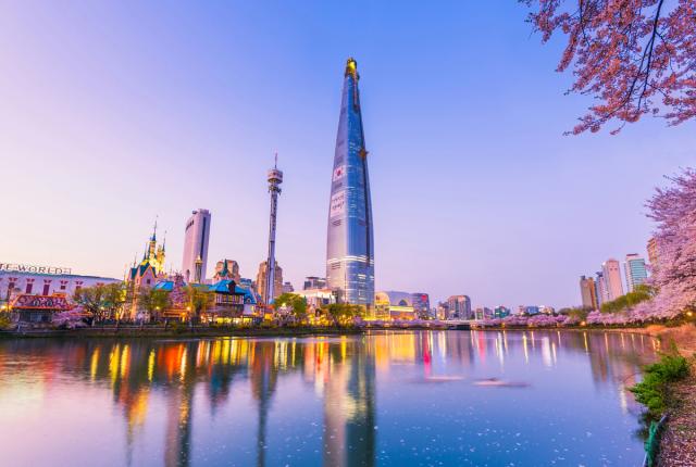A view of cherry blossoms and the skyline in Seoul, South Korea