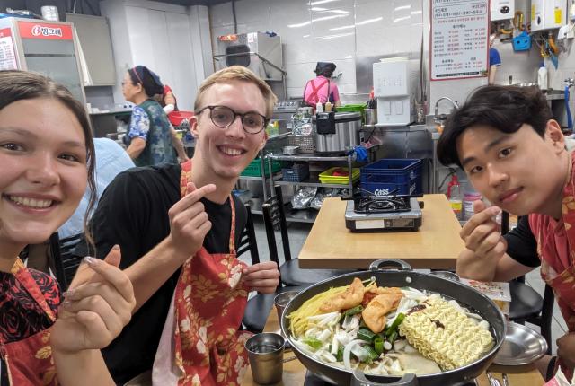 A photo of friends eating at Tteokbokki Restraunt in Seoul