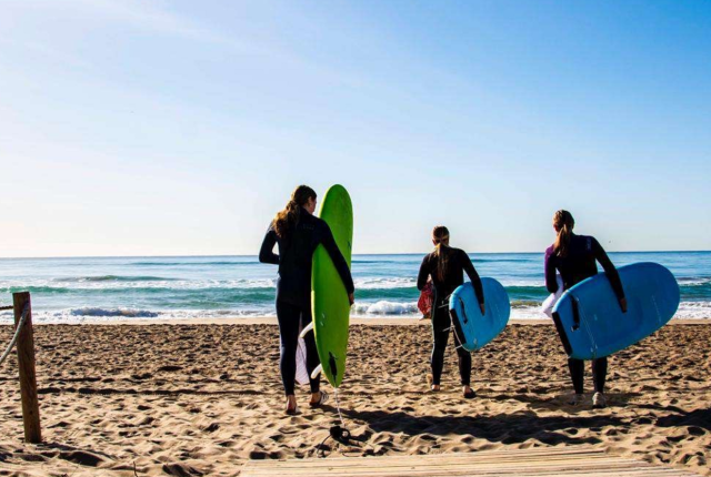 Surfers at a Barcelona beach