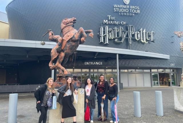 Students in front of Harry Potter Studios in London.