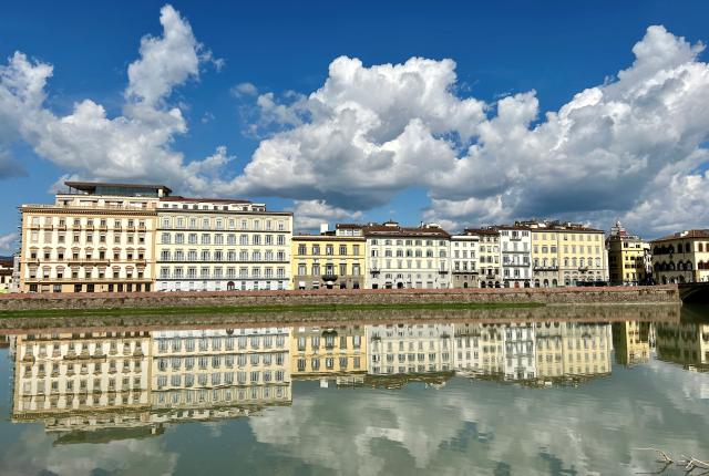 Skyline of Florence reflecting on the Arno river