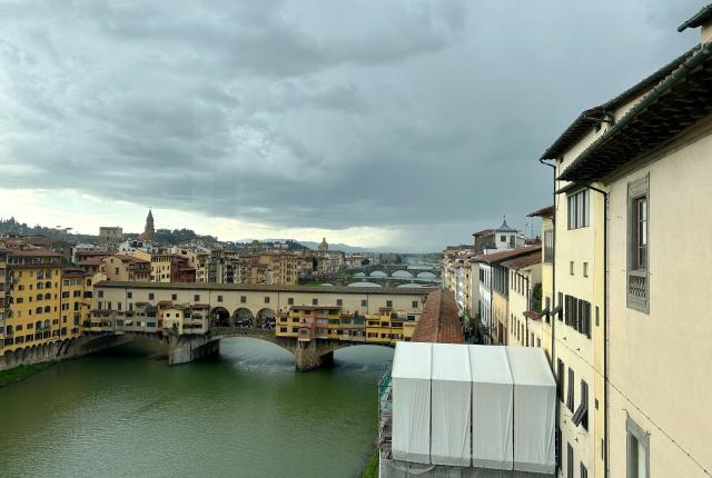 View of river and bridge in Florence Italy