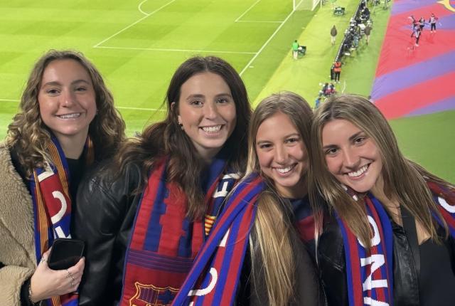 Friends at a soccer game in Barcelona
