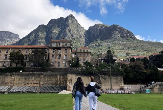 Two friends walking to class at the University of Cape Town in Cape Town, South Africa