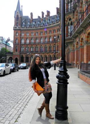 a student intern poses for a photo outside of King's Cross in London